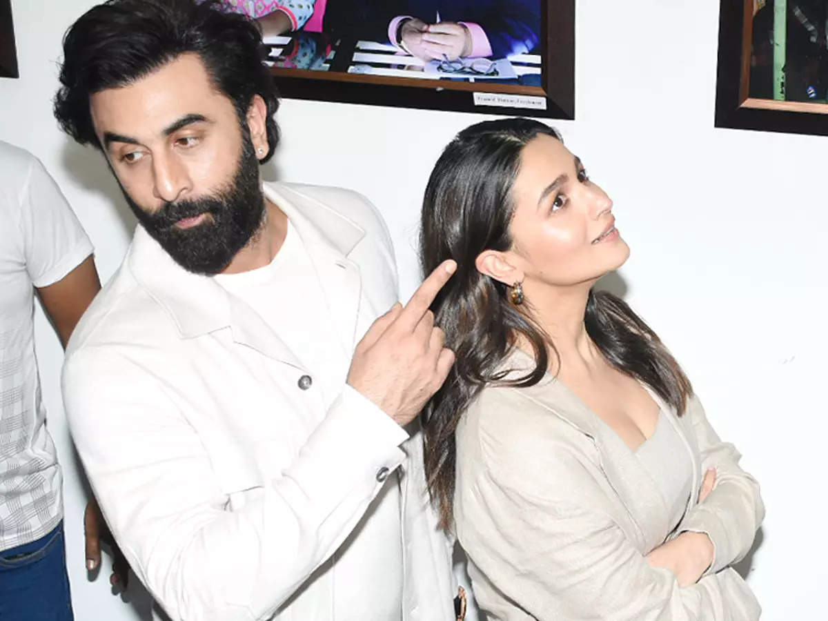Alia bhatt and Ranbir Kapoor at an event
